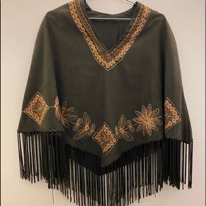 Woman’s suede handmade poncho